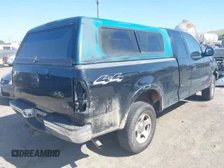 2003 Ford F-150 XL with VIN 2FTRX18L33CA33367, listed as a IAAI auction lot 42122086 with 1 mi miles. Bid and sale history available at carsss.com. Image 4.