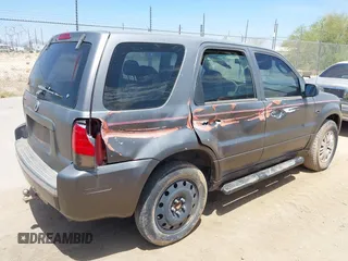 2006 Mercury Mariner Convenience with VIN 4M2YU56ZX6DJ04338, listed as a IAAI auction lot 42564945 with 99,570 mi miles and . Bid and sale history available at DreamBid. Image 4.