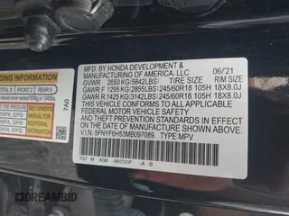 2021 Honda Pilot EX-L with VIN 5FNYF6H53MB097089, listed as a IAAI auction lot 42309359 with 58,371 mi miles and . Bid and sale history available at DreamBid. Image 9.