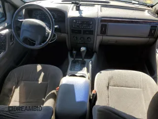 2000 Jeep Grand Cherokee Laredo z VIN 1J4GW48S8YC289367, wystawiony jako Copart lot #51378675 z przebiegiem 176 347 mil mil oraz Szkoda całkowita • Salvage title. Historia ofert i sprzedaży dostępna na DreamBid. Obrazek 8.