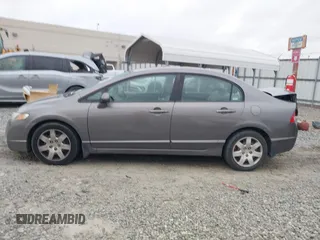 2009 Honda Civic LX z VIN 1HGFA16539L005299, wystawiony jako IAAI lot #41848263 z przebiegiem 169 019 mil mil oraz . Historia ofert i sprzedaży dostępna na DreamBid. Obrazek 14.