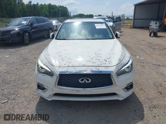 2018 Infiniti Q50 Luxe with VIN JN1EV7AP7JM352520, listed as a IAAI auction lot 42427317 with 73,717 mi miles and . Bid and sale history available at DreamBid. Image 12.