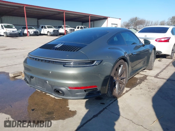 2024 Porsche 911 Carrera S with VIN WP0AB2A91RS219543, listed as a IAAI auction lot 41646404 with 2,644 mi miles. Bid and sale history available at carsss.com. Image 4.