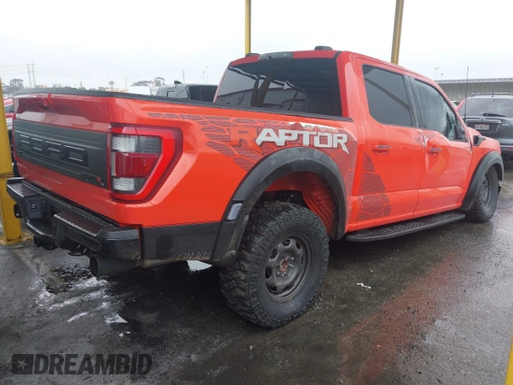 2023 Ford F-150 Raptor with VIN 1FTFW1RJ0PFC76292, listed as a IAAI auction lot 41458893 with 5,028 mi miles and . Bid and sale history available at DreamBid. Image 4.