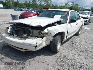 2001 Ford Crown Victoria LX z VIN 2FAFP74W81X102216, wystawiony jako IAAI lot #42388800 z przebiegiem 225 623 mil mil oraz . Historia ofert i sprzedaży dostępna na DreamBid. Obrazek 17.