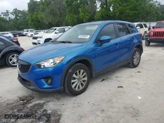 2013 Mazda CX-5 Touring with VIN JM3KE2CE5D0105420, listed as a Copart auction lot 50880655 with 250,524 mi miles and Salvage Title. Bid and sale history available at carsss.com. Image 1.