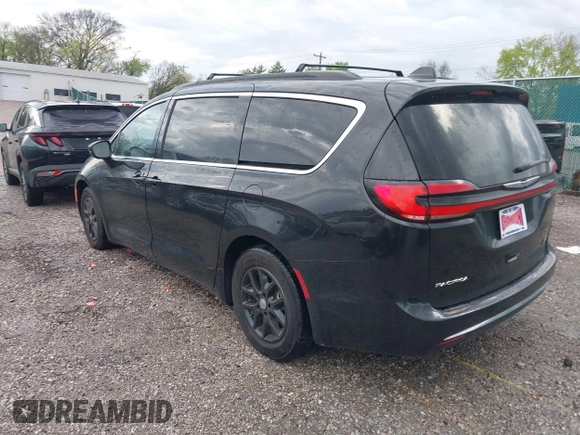 2022 Chrysler Pacifica Touring L with VIN 2C4RC1BG9NR194782, listed as a IAAI auction lot 41842410 with 76,231 mi miles and . Bid and sale history available at DreamBid. Image 3.