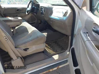 2000 Ford F-150 XL z VIN 1FTRX17W0YNB25467, wystawiony jako IAAI lot #42474329 z przebiegiem Nie podano mil oraz . Historia ofert i sprzedaży dostępna na DreamBid. Obrazek 5.