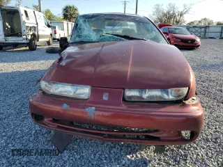 1999 Saturn SL z VIN 1G8ZK5278XZ173810, wystawiony jako Copart lot #42571425 z przebiegiem 114 580 mil mil oraz Szkoda całkowita • Salvage title. Historia ofert i sprzedaży dostępna na DreamBid. Obrazek 5.