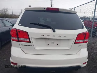 2014 Dodge Journey SXT with VIN 3C4PDCBB8ET153190, listed as a IAAI auction lot 41854655 with 153,048 mi miles and . Bid and sale history available at DreamBid. Image 16.