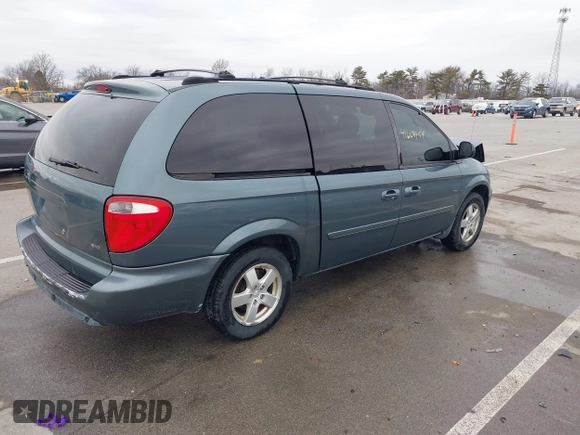 2005 Dodge Caravan SXT with VIN 2D4GP44LX5R115310, listed as a IAAI auction lot 41668454 with 115,784 mi miles and . Bid and sale history available at DreamBid. Image 4.
