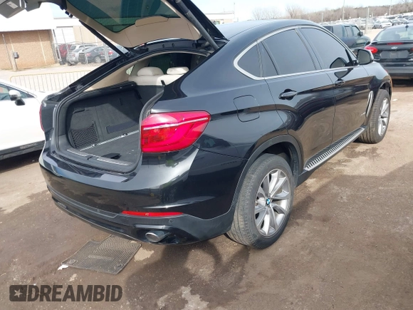 2015 BMW X6 xDrive35i z VIN 5UXKU2C56F0F95429, wystawiony jako IAAI lot #41754635 z przebiegiem 79 503 mil mil oraz . Historia ofert i sprzedaży dostępna na DreamBid. Obrazek 4.
