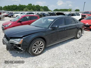 2012 Audi A8 с VIN WAURVAFDXCN026781, выставлен на аукционе Copart как лот 59197615 с пробегом 160 567 миль миль и Списание • Salvage title. История ставок и продаж доступна на DreamBid. Изображение 1.