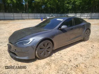 2022 Tesla Model S Plaid с VIN 5YJSA1E66NF488100, выставлен на аукционе Copart как лот 57935675 с пробегом Не указан миль и Списание • Salvage title. История ставок и продаж доступна на DreamBid. Изображение 1.