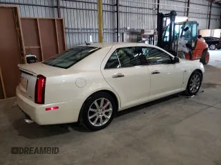 2007 Cadillac STS z VIN 1G6DW677170153246, wystawiony jako Copart lot #59531015 z przebiegiem 65 092 mil mil oraz Szkoda całkowita • Salvage title. Historia ofert i sprzedaży dostępna na DreamBid. Obrazek 3.