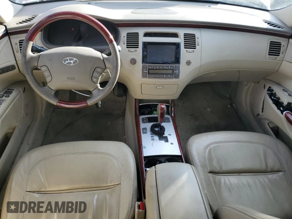 2007 Hyundai Azera SE z VIN KMHFC46F47A187747, wystawiony jako Copart lot #80963194 z przebiegiem 113 742 mil mil oraz Szkoda całkowita • Salvage title. Historia ofert i sprzedaży dostępna na DreamBid. Obrazek 8.