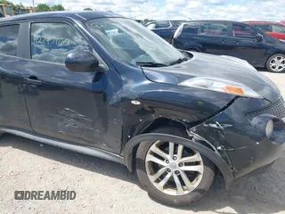 2013 Nissan Juke S with VIN JN8AF5MV5DT229742, listed as a IAAI auction lot 42797100 with 101,300 mi miles and . Bid and sale history available at DreamBid. Image 6.