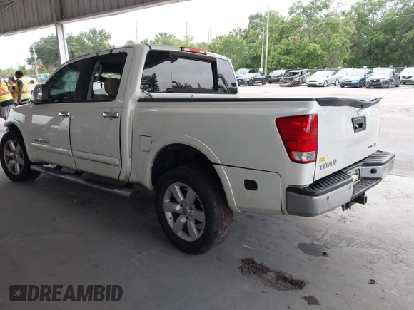 2015 Nissan Titan SV z VIN 1N6BA0ED1FN502929, wystawiony jako IAAI lot #42431227 z przebiegiem 138 394 mil mil oraz . Historia ofert i sprzedaży dostępna na DreamBid. Obrazek 3.