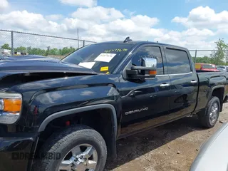 2015 GMC Sierra 2500HD Denali with VIN 1GT120E82FF574358, listed as a IAAI auction lot 42377676 with 86,097 mi miles and . Bid and sale history available at DreamBid. Image 14.