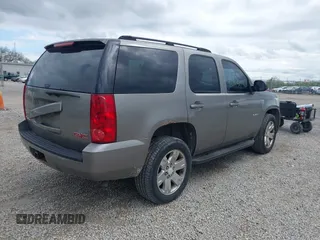 2007 GMC Yukon SLT z VIN 1GKFK13077R129885, wystawiony jako IAAI lot #42184207 z przebiegiem 264 848 mil mil oraz . Historia ofert i sprzedaży dostępna na DreamBid. Obrazek 4.