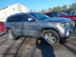 2014 Jeep Grand Cherokee Laredo with VIN 1C4RJFAG4EC372188, listed as a IAAI auction lot 41886968 with 235,069 mi miles. Bid and sale history available at carsss.com. Image 13.