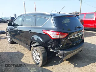 2014 Ford Escape Titanium with VIN 1FMCU9J93EUD60149, listed as a IAAI auction lot 39837388 with 154,880 mi miles. Bid and sale history available at carsss.com. Image 3.