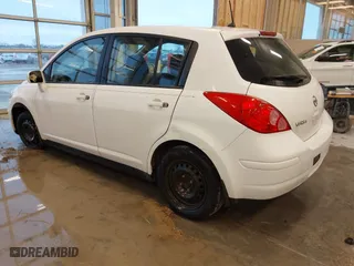 2009 Nissan Versa 1.8 S with VIN 3N1BC13E69L386083, listed as a IAAI auction lot 41717999 with 99,511 mi miles. Bid and sale history available at carsss.com. Image 3.