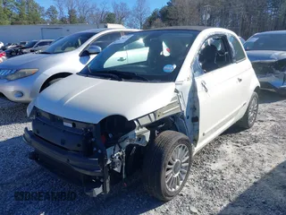 2012 FIAT 500 Gucci with VIN 3C3CFFER7CT119178, listed as a IAAI auction lot 41592427 with 63,836 mi miles. Bid and sale history available at carsss.com. Image 2.