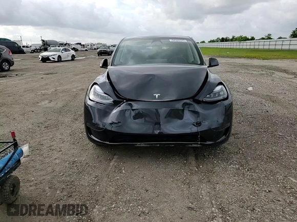 2024 Tesla Model Y с VIN 7SAYGDED4RA329638, выставлен на аукционе Copart как лот 54562525 с пробегом 8 606 миль миль и Списание • Salvage title. История ставок и продаж доступна на DreamBid. Изображение 13.