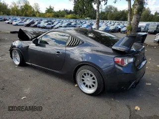 2015 Subaru BRZ Premium with VIN JF1ZCAB18F9602102, listed as a Copart auction lot 75958264 with 72,692 mi miles and Salvage title. Bid and sale history available at DreamBid. Image 2.