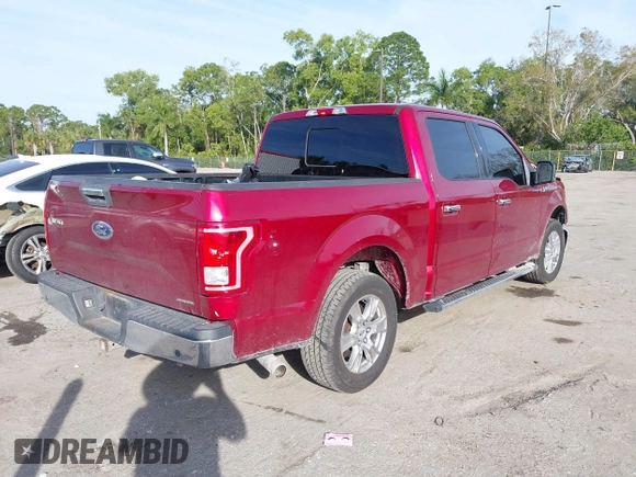 2015 Ford F-150 XLT with VIN 1FTEW1C87FKD70547, listed as a IAAI auction lot 41451841 with 151,596 mi miles and . Bid and sale history available at carsss.com. Image 4.