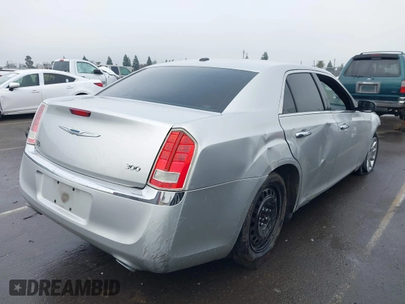 2011 Chrysler 300 Limited with VIN 2C3CA5CG9BH614354, listed as a IAAI auction lot 41216730 with 141,670 mi miles. Bid and sale history available at carsss.com. Image 4.