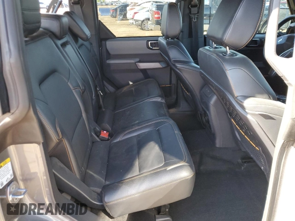 2023 Ford Bronco with VIN 1FMEE5DP0PLC10002, listed as a Copart auction lot 57272555 with 14,035 mi miles and Salvage title. Bid and sale history available at DreamBid. Image 11.