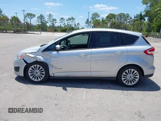 2018 Ford C-Max SE z VIN 1FADP5AU1JL104191, wystawiony jako IAAI lot #42153994 z przebiegiem 132 413 mil mil oraz . Historia ofert i sprzedaży dostępna na DreamBid. Obrazek 14.