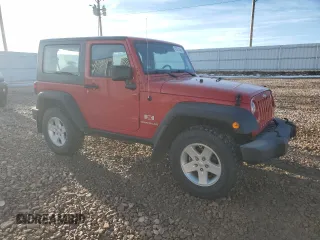 2009 Jeep Wrangler X with VIN 1J4FA24169L727333, listed as a Copart auction lot 47861445 with 70,343 mi miles and Salvage Title. Bid and sale history available at DreamBid. Image 4.