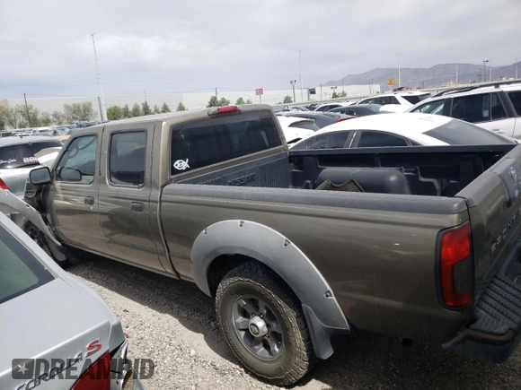 2002 Nissan Frontier XE z VIN 1N6ED29X92C367175, wystawiony jako Copart lot #54979685 z przebiegiem 281 470 mil mil oraz Szkoda całkowita • Salvage title. Historia ofert i sprzedaży dostępna na DreamBid. Obrazek 2.