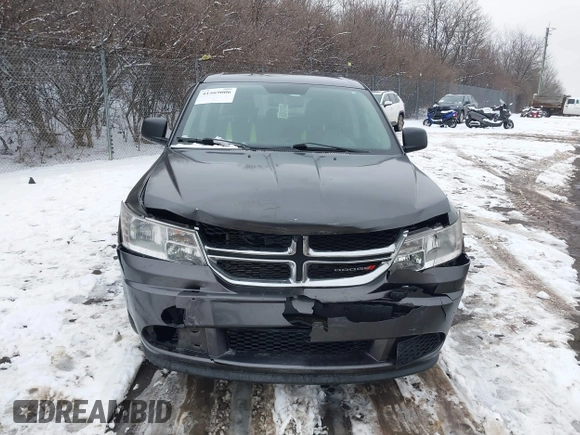 2014 Dodge Journey SE with VIN 3C4PDCAB0ET182376, listed as a IAAI auction lot 41569006 with 106,024 mi miles and . Bid and sale history available at DreamBid. Image 12.
