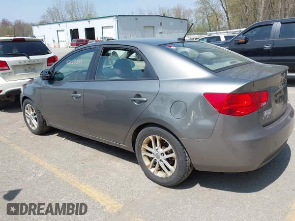 2011 Kia Forte EX with VIN KNAFU4A22B5405396, listed as a IAAI auction lot 42125381 with 209,300 mi miles. Bid and sale history available at carsss.com. Image 3.