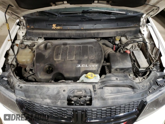 2015 Dodge Journey Crossroad with VIN 3C4PDDGGXFT748991, listed as a Copart auction lot 47484915 with 124,367 mi miles and Salvage Title. Bid and sale history available at carsss.com. Image 12.