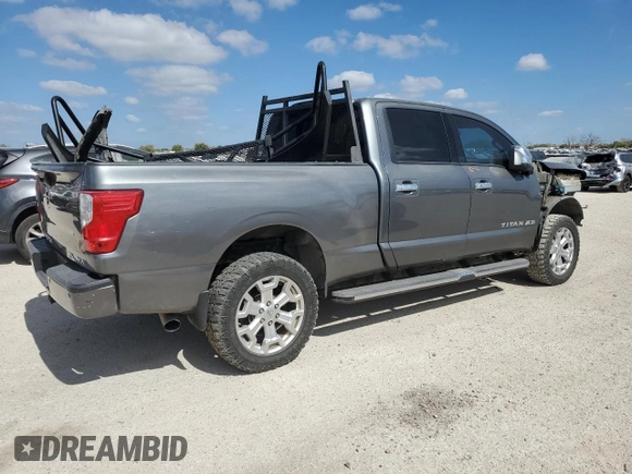 2016 Nissan Titan XD PRO-4X with VIN 1N6BA1F47GN512757, listed as a Copart auction lot 77429314 with 152,756 mi miles and Salvage Title. Bid and sale history available at carsss.com. Image 3.