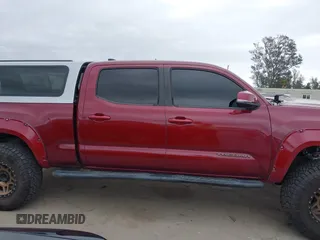 2017 Toyota Tacoma SR5 with VIN 3TMDZ5BN7HM017500, listed as a IAAI auction lot 41819027 with 112,406 mi miles. Bid and sale history available at carsss.com. Image 13.