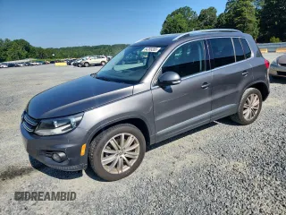 2014 Volkswagen Tiguan SE with VIN WVGAV3AX0EW568073, listed as a Copart auction lot 64289265 with 92,050 mi miles and Salvage title. Bid and sale history available at DreamBid. Image 1.