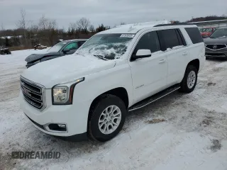 2020 GMC Yukon SLT with VIN 1GKS2BKC1LR280389, listed as a Copart auction lot 87928555 with 84,242 mi miles and Salvage Title. Bid and sale history available at carsss.com. Image 1.