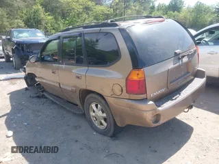 2003 GMC Envoy SLT with VIN 1GKDS13S832208655, listed as a IAAI auction lot 42076668 with 160,787 mi miles. Bid and sale history available at carsss.com. Image 3.
