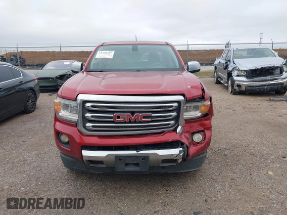2015 GMC Canyon 2WD SLT with VIN 1GTG5CE3XF1211164, listed as a IAAI auction lot 41490387 with 163,932 mi miles. Bid and sale history available at carsss.com. Image 12.