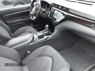 2019 Toyota Camry Hybrid LE z VIN 4T1B31HK5KU510055, wystawiony jako IAAI lot #42325522 z przebiegiem 97 000 mil mil oraz . Historia ofert i sprzedaży dostępna na DreamBid. Obrazek 5.