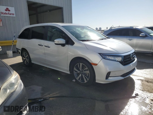 2023 Honda Odyssey Touring with VIN 5FNRL6H80PB024709, listed as a Copart auction lot 47594375 with Not Provided miles and Salvage Title. Bid and sale history available at DreamBid. Image 4.