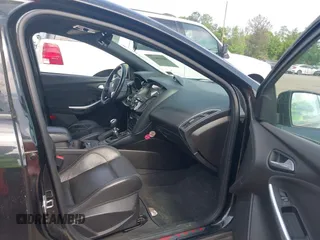 2014 Ford Focus ST with VIN 1FADP3L98EL269058, listed as a IAAI auction lot 42169021 with 106,325 mi miles and . Bid and sale history available at carsss.com. Image 5.