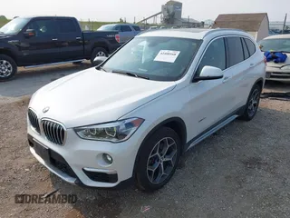 2017 BMW X1 xDrive28i with VIN WBXHT3C39H5F84338, listed as a IAAI auction lot 42400168 with 48,673 mi miles and . Bid and sale history available at DreamBid. Image 18.