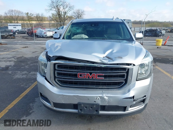 2015 GMC Yukon XL SLT z VIN 1GKS2HKCXFR618783, wystawiony jako IAAI lot #42081053 z przebiegiem 230 368 mil mil oraz . Historia ofert i sprzedaży dostępna na DreamBid. Obrazek 13.